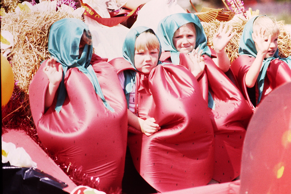 Four children dressed in strawberry costumes as part of the Strawberry Festival (1986). From Redland Libraries digitised local history collection. http://redl.sdp.sirsidynix.net.au/client/search/asset/1004706
