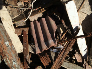 Dumped material containing asbestos